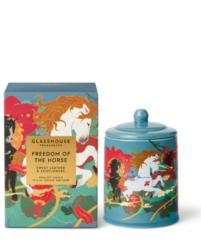 Glasshouse Fragrances Freedom of the Horse 380g candle featuring Christmas artwork and gold decorative detailing.