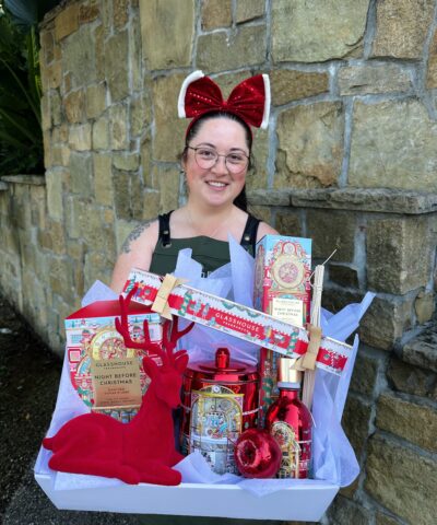 Glasshouse Christmas Luxury Reindeer Hamper featuring festive candles, diffuser and red velvet reindeer, styled by The Lush Lily.