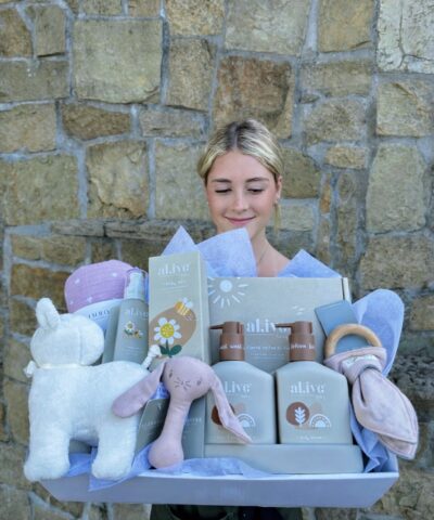 Little Love Luxe Baby Hamper featuring Alimrose baby toys, al.ive baby wash and lotion, baby oil, swaddle and teething ring, beautifully gift wrapped