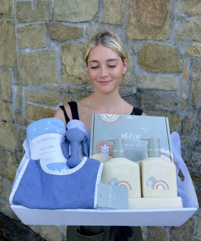 Little Dreamer Baby Hamper featuring Alimrose baby bib, swaddle and rattle with al.ive baby wash and lotion, beautifully gift wrapped