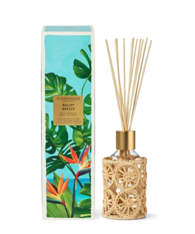 Balmy Breeze 250mL fragrance diffuser by Glasshouse Fragrances with reed sticks and illustrated box.