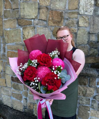 Pink and red rose bouquet with vibrant blooms and luxe wrapping by The Lush Lily Brisbane florist.