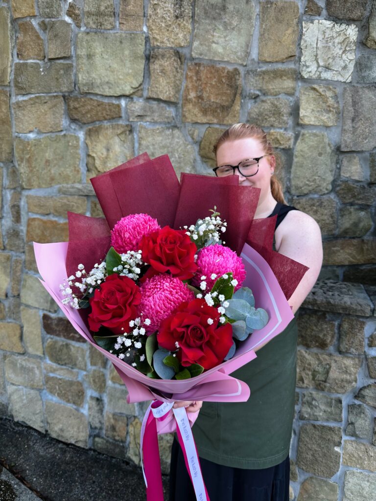 Pink and red rose bouquet with vibrant blooms and luxe wrapping by The Lush Lily Brisbane florist.