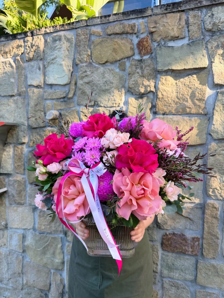 Pink Pop bright pink flower vase arrangement with roses and seasonal blooms by The Lush Lily Brisbane